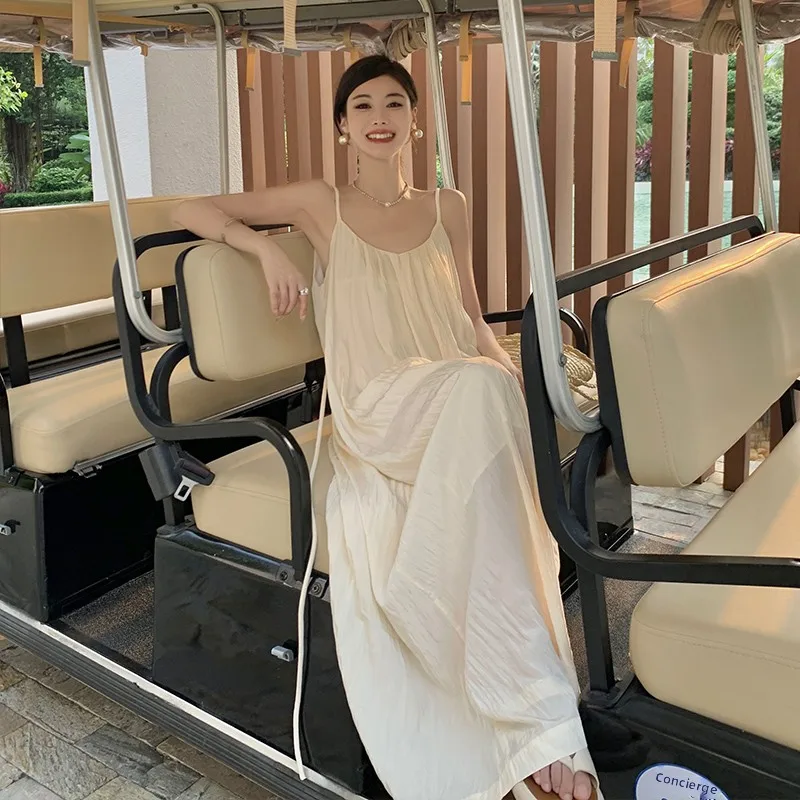 فستان طويل بدون ظهر للنساء لقضاء العطلات على الشاطئ، تصميم فضفاض، تنورة صيفية على شكل حرف A، ياقة مستديرة بدون أكمام