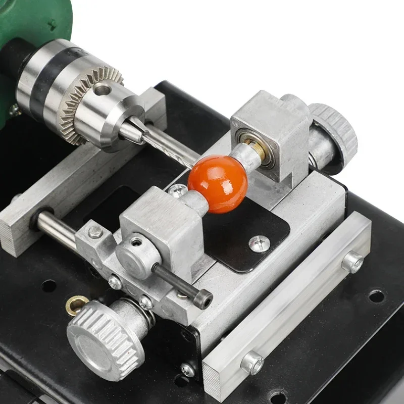 Jewelry stone cutting machine with drilling device polishing water system