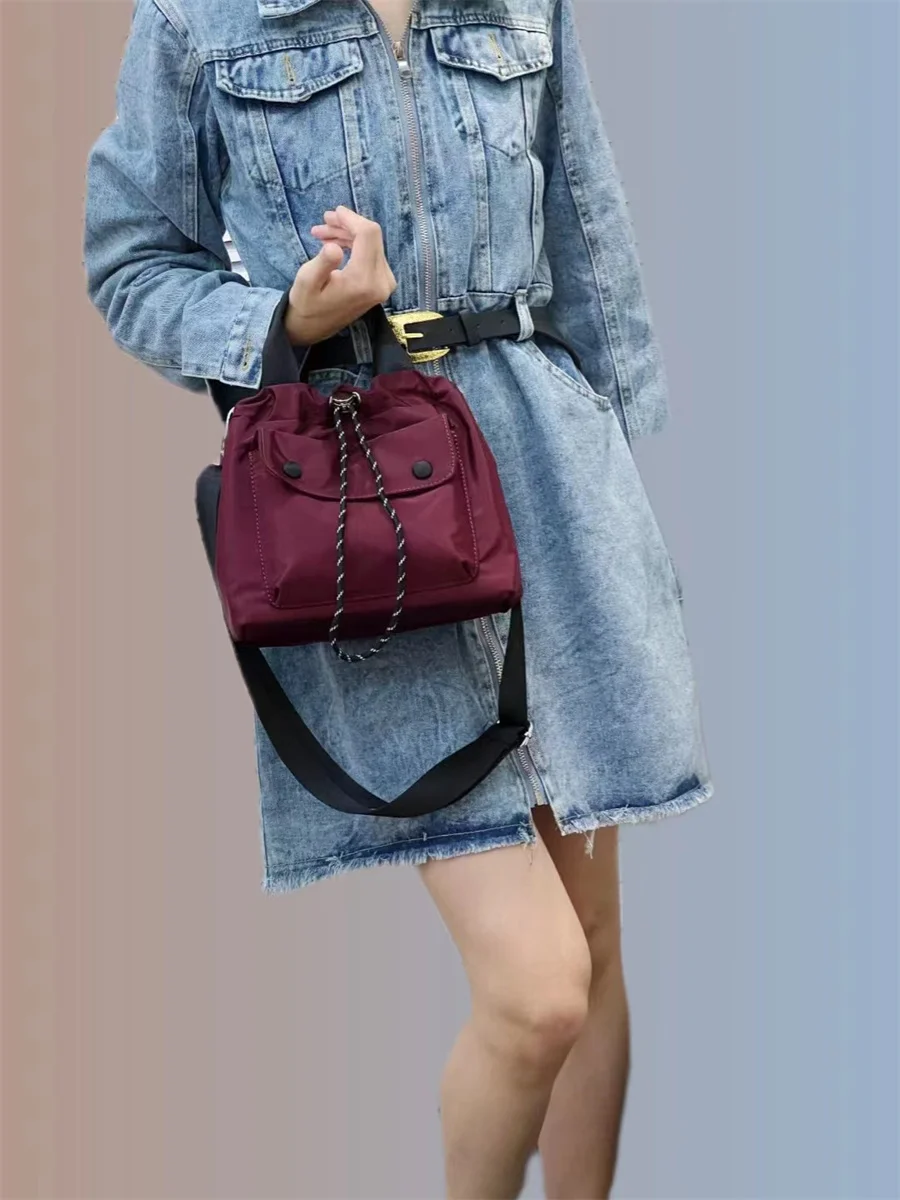 

Spring Summer 2023 New Small Size Waterproof Nylon Camouflage Buet Bag Korean Sle Handbag Crossbody Bag Leisure Faion