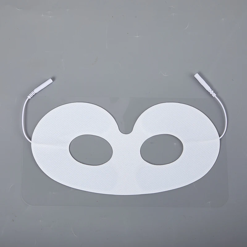 غير المنسوجة ذاتية اللصق EMS قناع عين غطاء عشرات القطب الوسادة لمدلك العلاج بالنبض الإلكتروني مع ثقب التوصيل