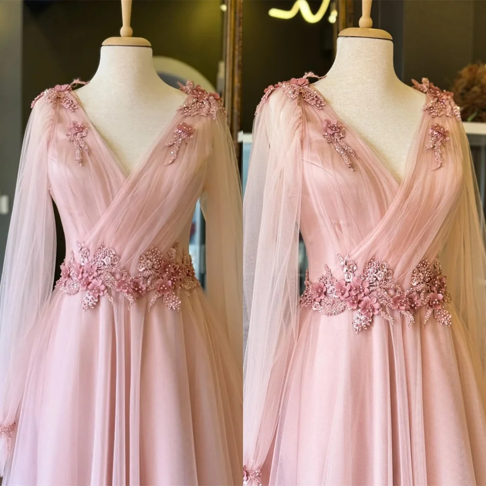 فستان سهرة رسمي من التول الوردي على الموضة مخصص برقبة على شكل حرف v وأكمام طويلة وأربطة من الخلف وزهور لؤلؤية بدون ظهر فستان العودة للوطن