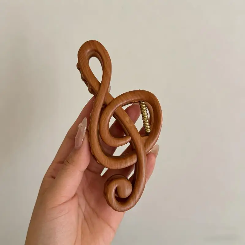 Pince à cheveux minimaliste en forme de note de musique pour femmes et filles, fixation sécurisée pour cheveux épais, idéale pour le coiffage quotidien