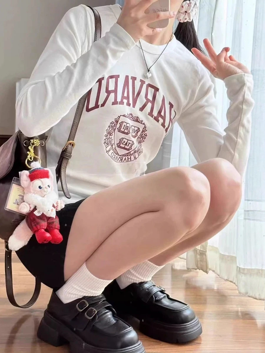 تي شيرت نسائي بأكمام طويلة ورقبة دائرية مطبوع عليه حروف تي شيرت نسائي جديد من القطن الناعم غير رسمي ملابس الشارع الشهير تي شيرت نسائي لطيف للخريف الحلو Y2K