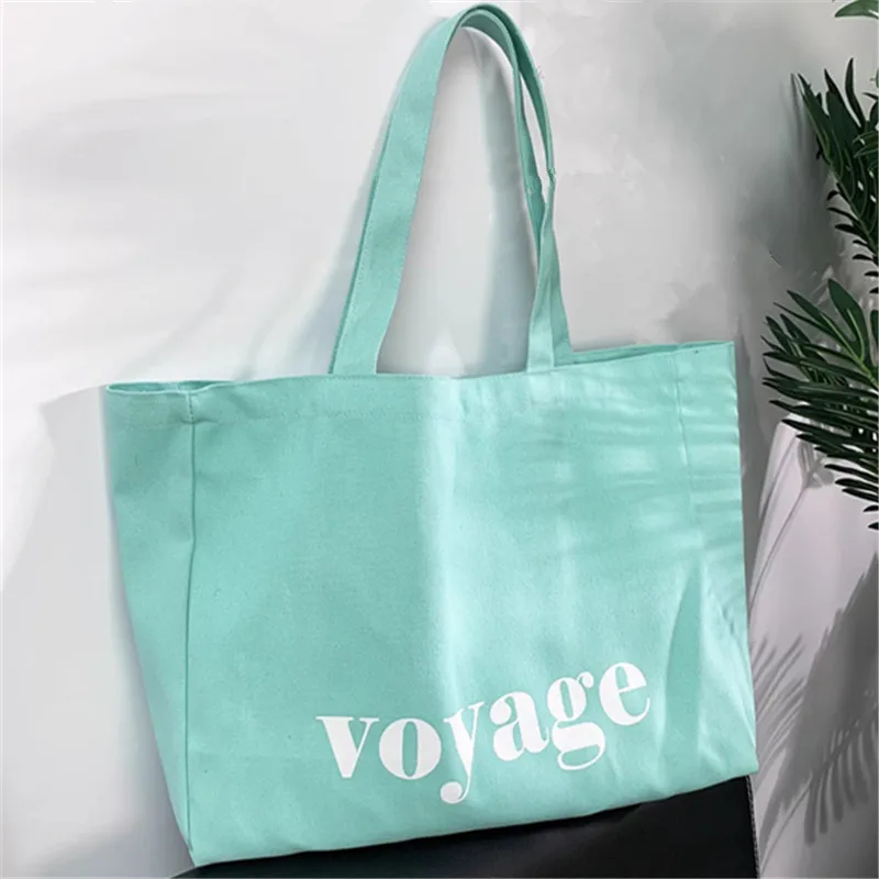 bolsa-tote-de-lona-estampada-com-letras-casuais-da-moda-bolsa-de-ombro-de-grande-capacidade-estilo-universitario-unissex-adequada-para-deslocamento-escolar