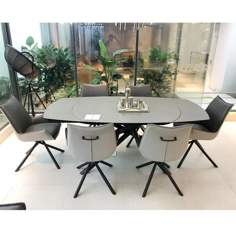 Italian minimalist imported Calais rock slab retractable dining table modern simple living room oval rotating dining table