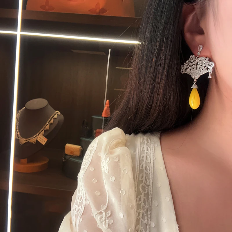 Luxurious hollow fan earrings long yellow drop dinner advanced jewelry