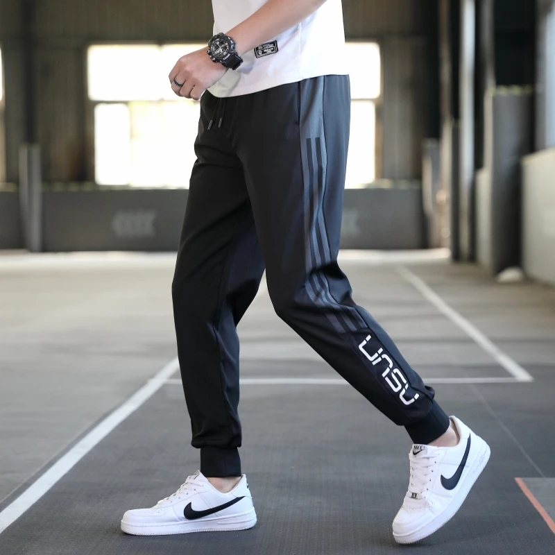 Spring Autumn Drawstring Men\'s Elastic Waist Solid Striped Pockets Printin Harlan Sports Trousers Fashion Casual Loose Pants