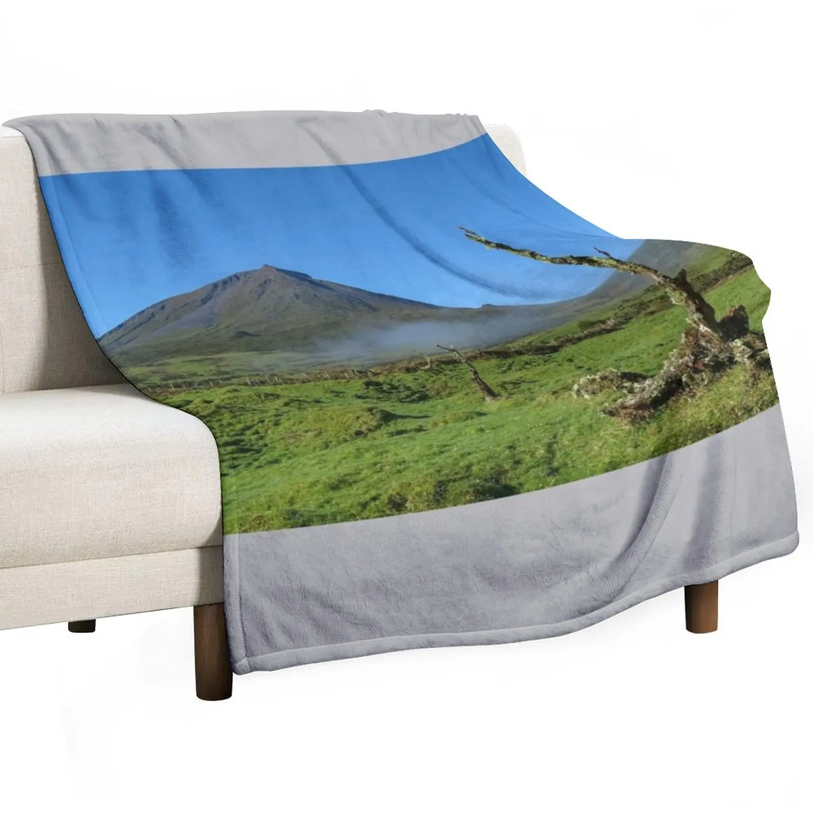 Amazing nature landscape, Pico mountain with some clouds, Azores islands, travel destination. Throw Blanket Bed Blankets