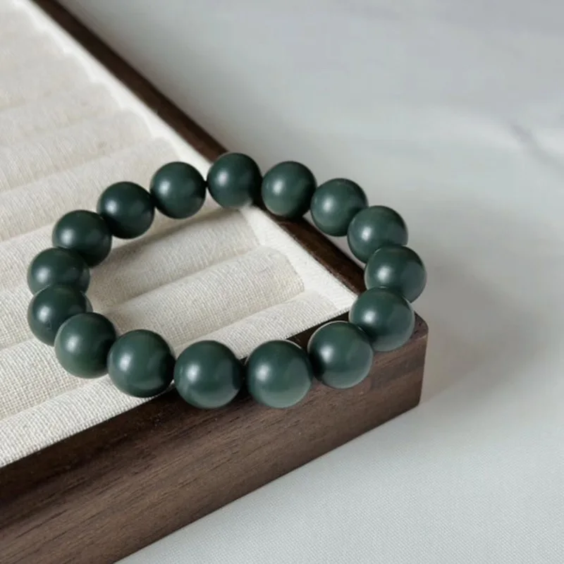 Hetian Bracelet, A Fine-Grade String Of Natural Jade , Featuring Exceptionally Small, Round Beads In A Delica