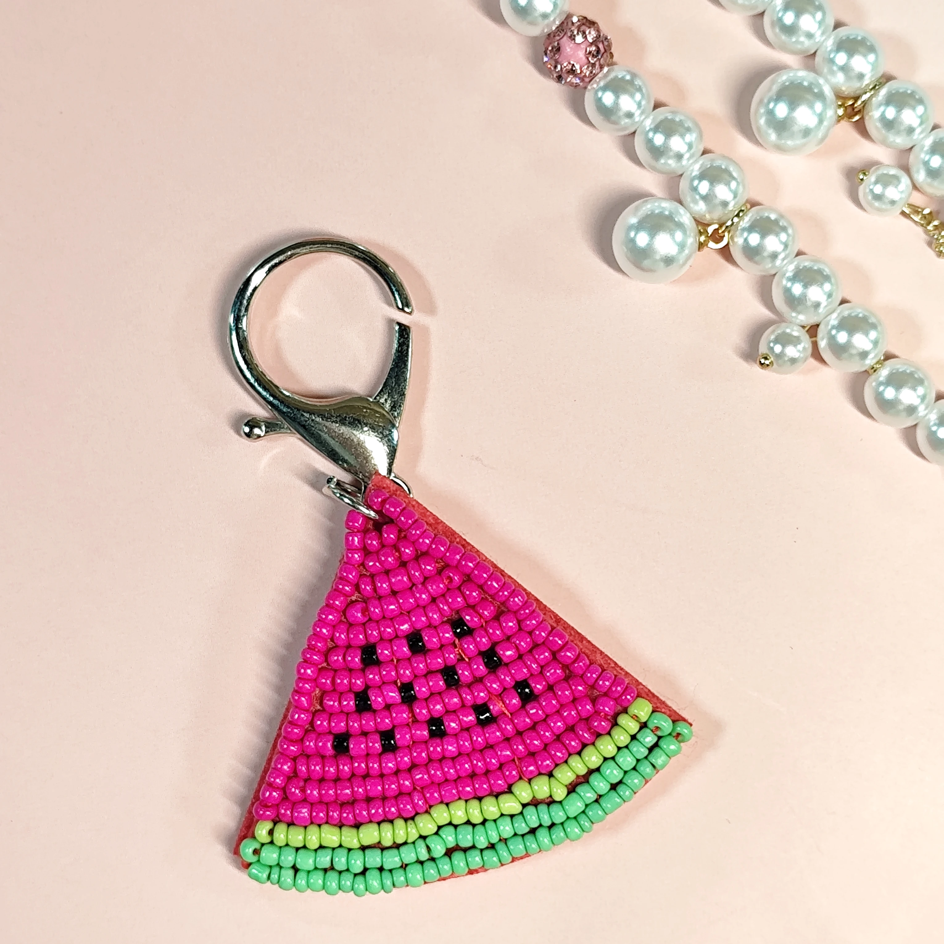 This beaded watermelon slice keychain is super cute! Colorful beads form a vivid watermelon.
