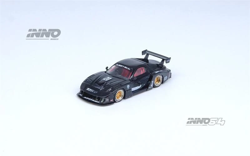 

Модель автомобиля INNO 1:64 RX7 (FD3S) цвет черный/белый