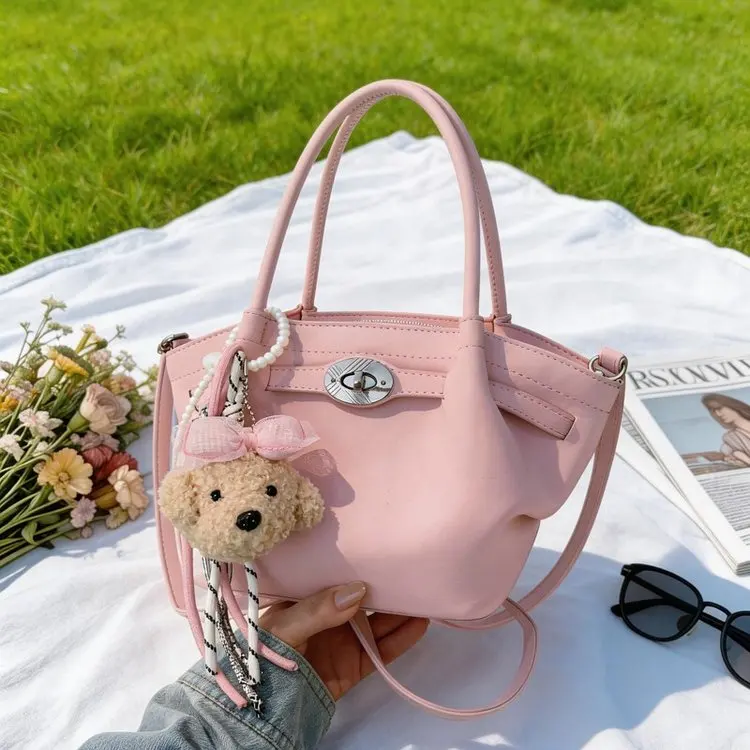 

2026 New Soft Leather Buckle Bucket Bag for Women Bear Charm Versatile -Way Shoulder Crossbody Bag