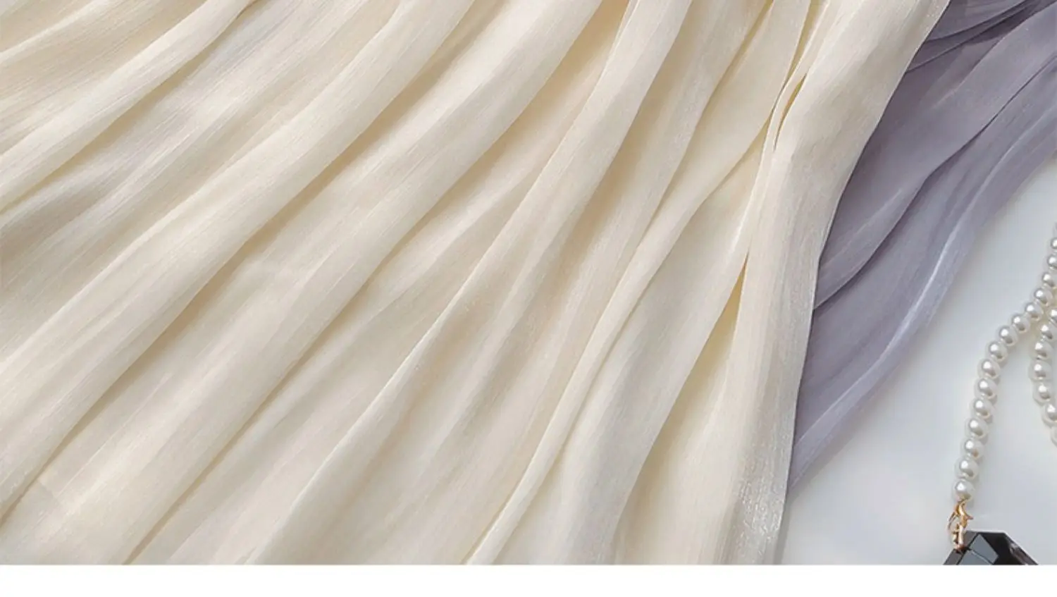 2026 Frühjahr/Sommer Neuer Glänzender A-Linien-Rock für Damen, Einfarbig, Hohe Taille, Französischer Pariser Stil, Eleganter Asymmetrischer Rock – Detail 6