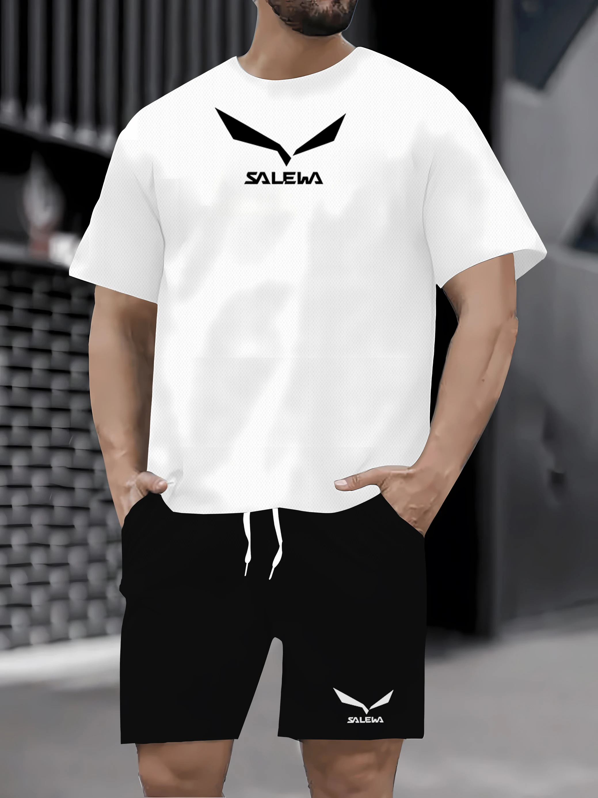 

Masculino 2025 лет novo terno спортивный повседневный модный респиратор и livre masculino de manga curta camiseta + шорты trein