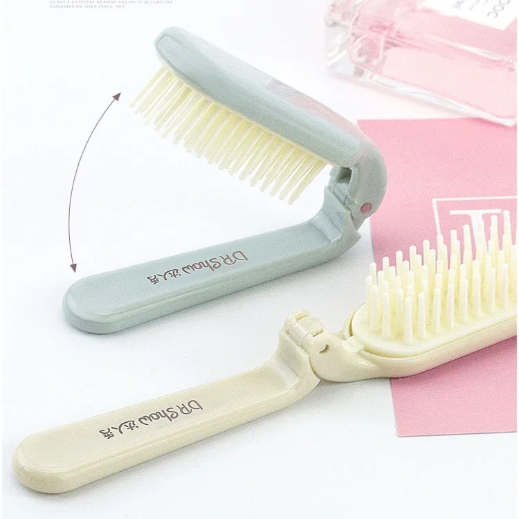 

Mini folding massage comb student ladies portable