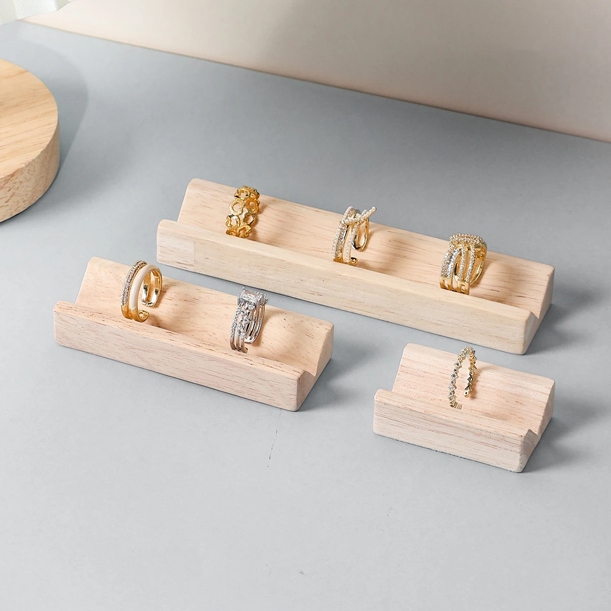 Exclusive V-slot Display Stand for Jewelry, Rubber Wooden Watch Display Stand, Jewelry Tray on the Shopping Mall Counter, Photo