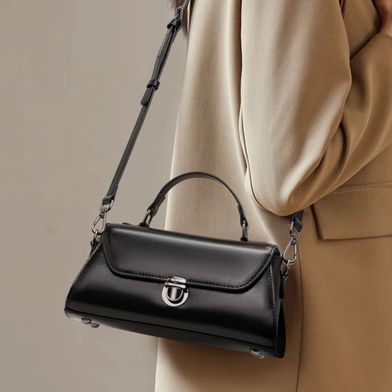 

Aidrani Structured Black Bag: Premium Leather with Convertible Strap & Metal Lock