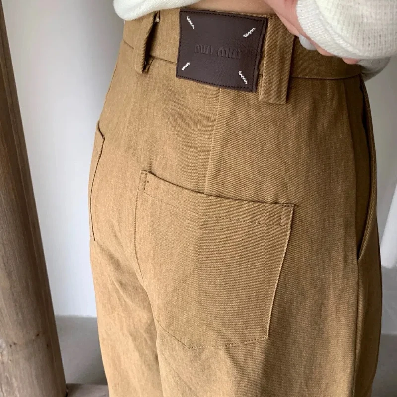 Korean 2025 New Spring Summer Pleated Women Pants High Khaki Temperament Fashion Button Patchwork Pockets Wide Leg Trousers
