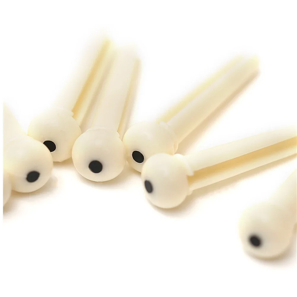 Upgrade Your Guitar's Stability with 12 Plastic Bridge Pins, Suitable for Most Acoustic Guitars, Ideal for Guitar Enthusiasts