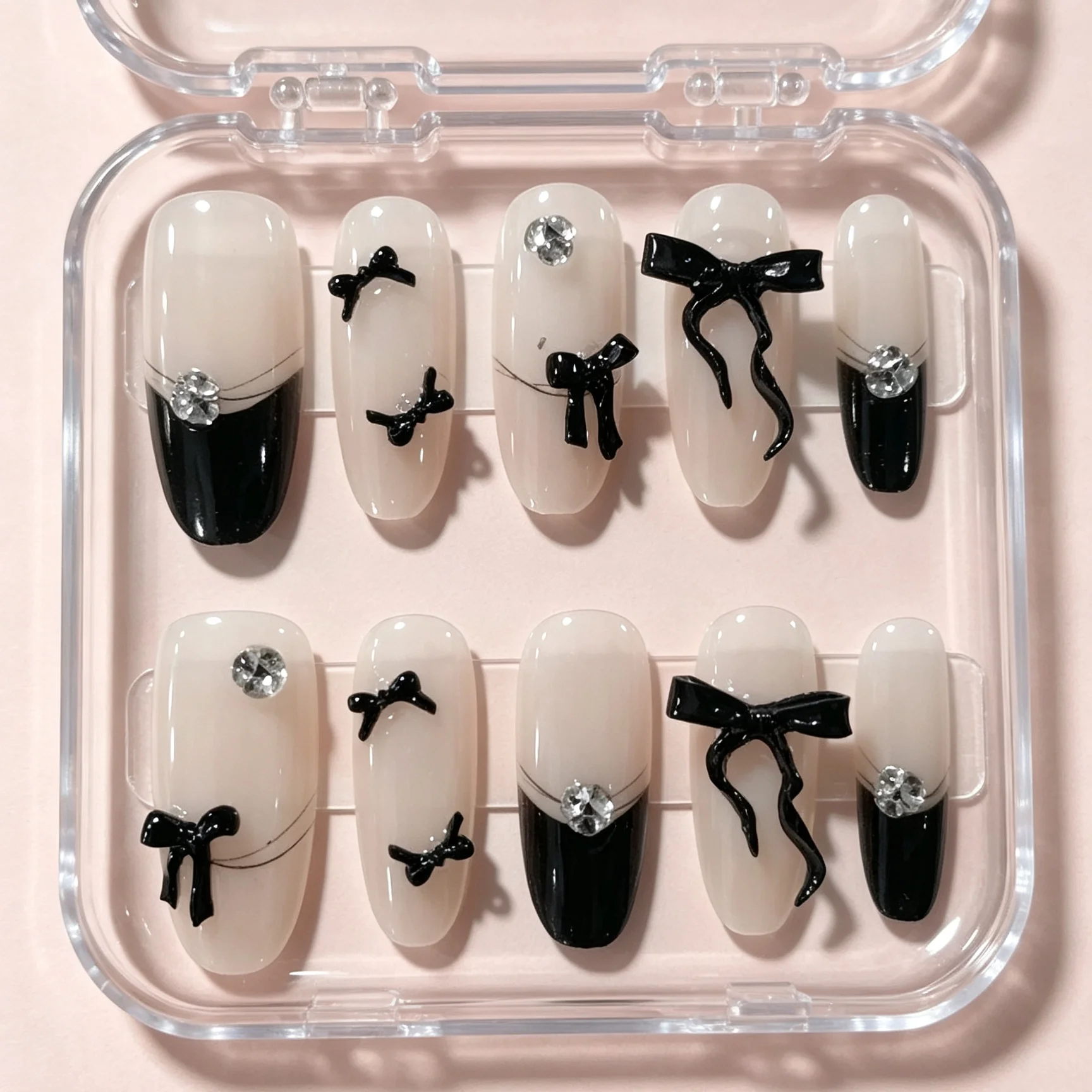10 pièces de faux ongles en forme d'amande pressés à la main, magnifiques faux ongles, nœud en ruban français noir, adaptés aux femmes.