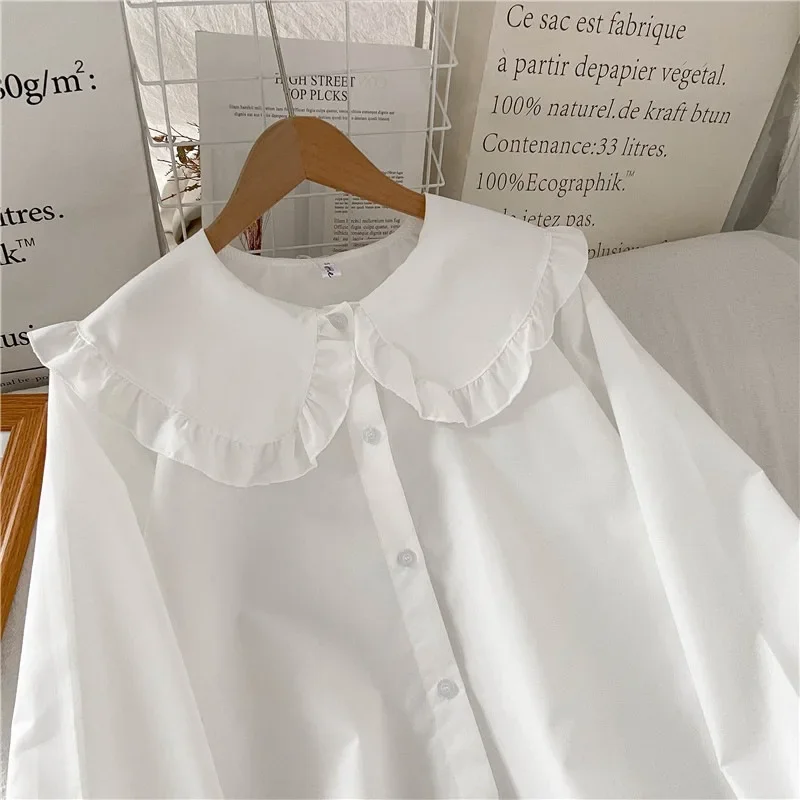 تنوعا طويلة الأكمام قميص أبيض المرأة أوائل الخريف جديد الفرنسية خمر تصميم فضفاض طبقات قميص الأميرة كم دمية طوق