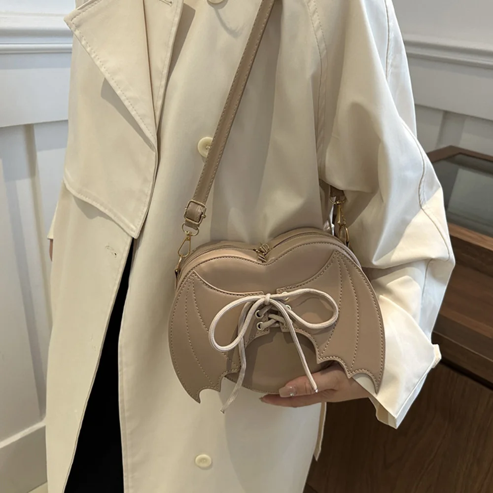 Korean-style Ins fashionable cute girl's bag 2026 new style simple small square bag personalized batwing shoulder messenger bag view 5