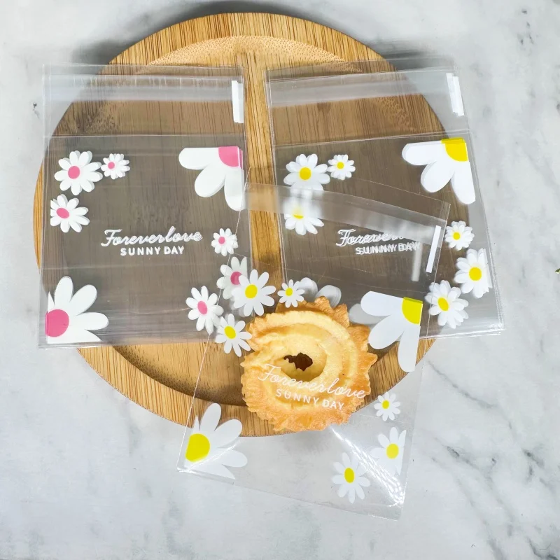 100pcs 100pcs 7cm Daisy Flower Plastic Self Adhesive Cookie Packaging Bag Wedding Candy Gift Decoration Bag Biscuits Snack Package - Aliexpress Deal