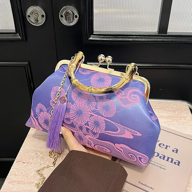 

​​2025 New Arrival Embroidered Qipao Inspired Handbag Elegant Tassel Clutch Chain Shoulder Bag​​ ​​Key Features