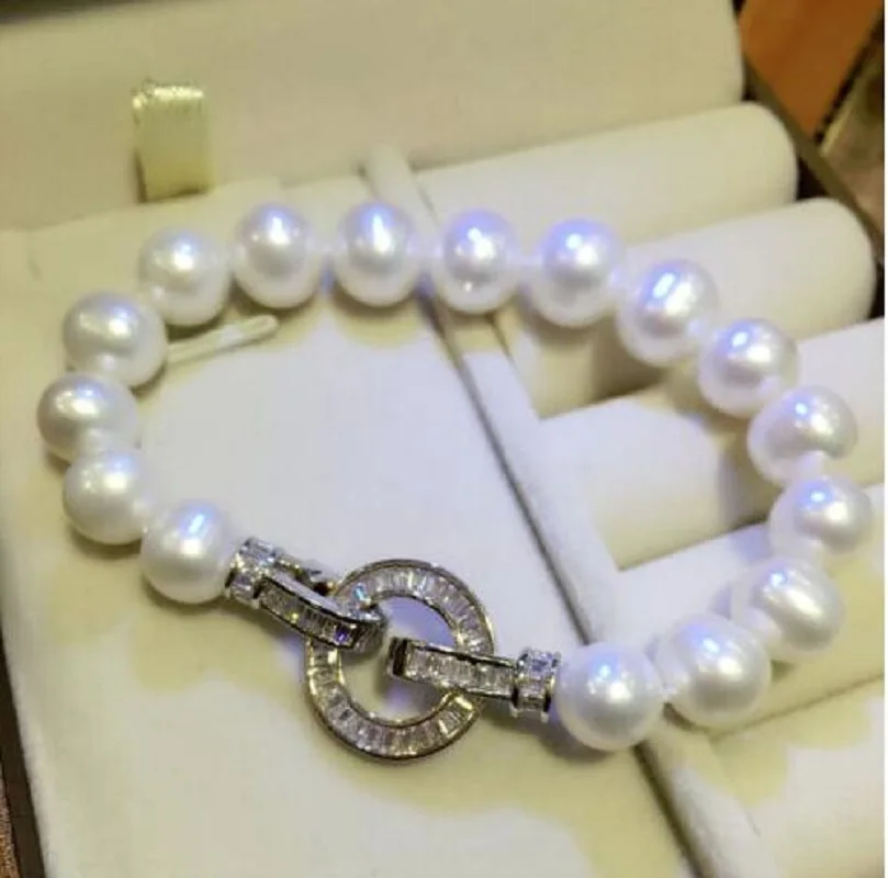 

AAAA 9-10mm natural south sea white pearl bracelet 7.5-8" sterling silver clasp