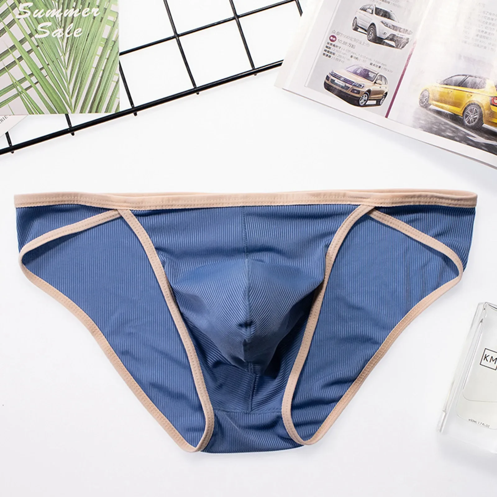 Verano hombres Ultra fino hielo seda velocidad piel seca Sexy cintura baja Color sólido triángulo ropa interior Boxer para hombres