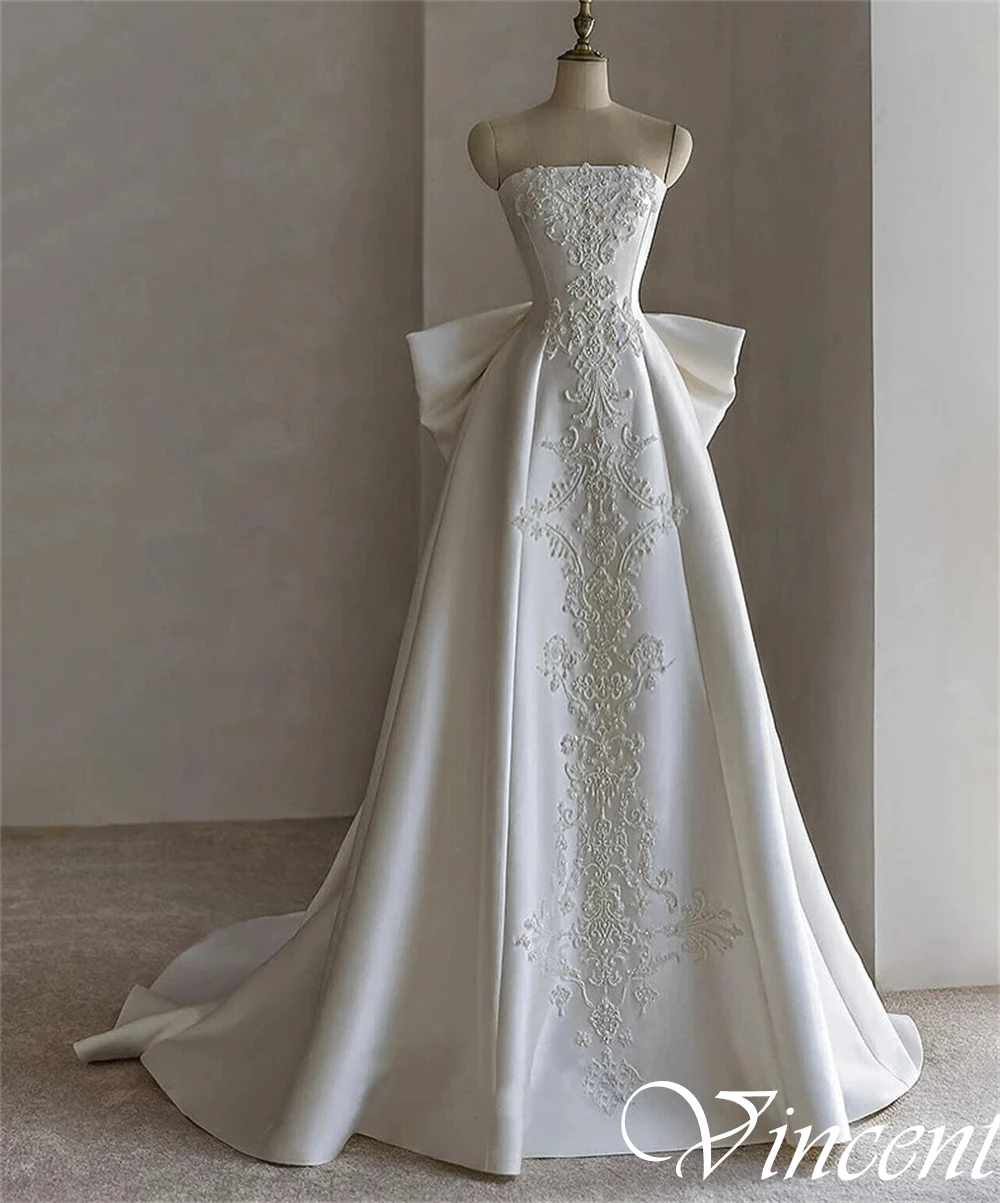 فساتين زفاف عصرية مخصصة بدون حمالات من الساتان بدون أكمام على شكل حرف a فستان زفاف كلاسيكي بفيونكة كريستال عالية الجودة رداء de mariée