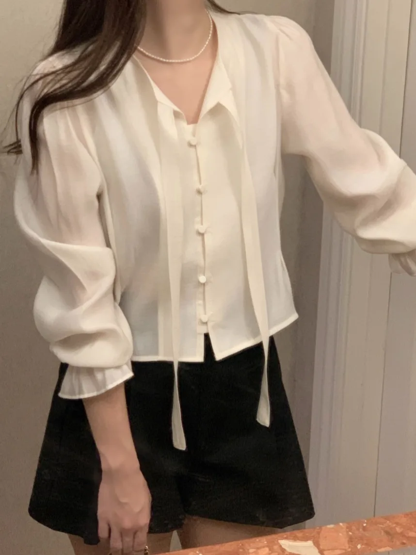 تصميم كوري للنساء ort Sve irt ربيع 2025 جديد Sweet Ele Faionable Bell Sve Top Commute Sle Pure E-commerce