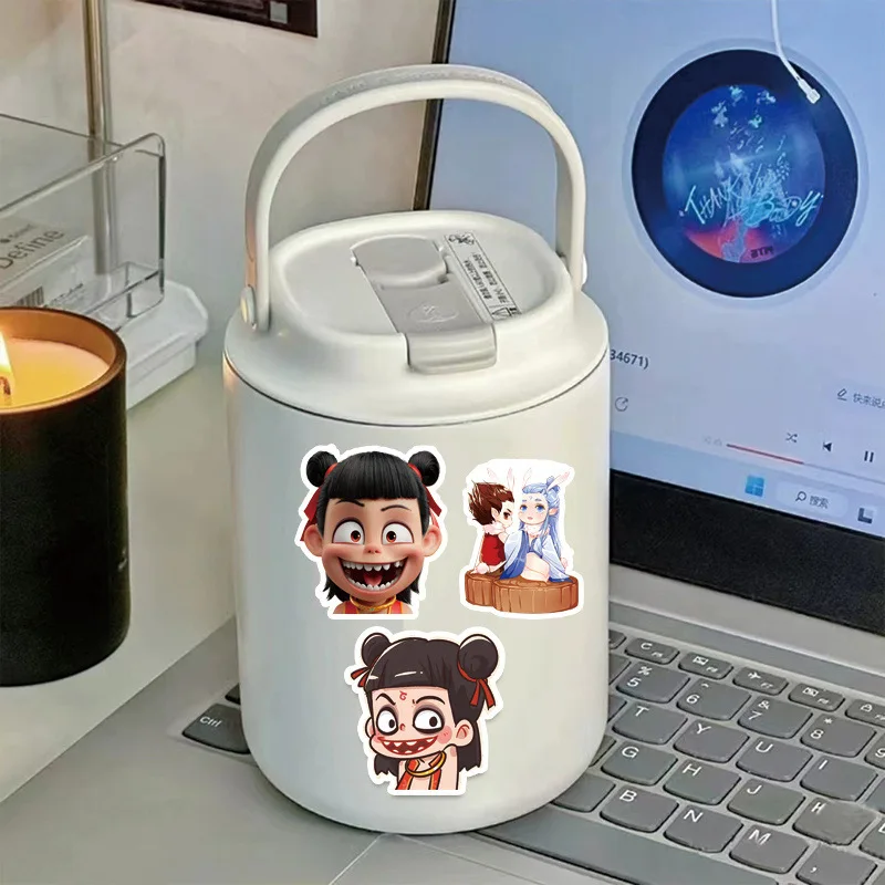 50 pçs dos desenhos animados chineses magia criança nezha série graffiti adesivos são adequados para capacete decoração de parede desktop adesivos diy