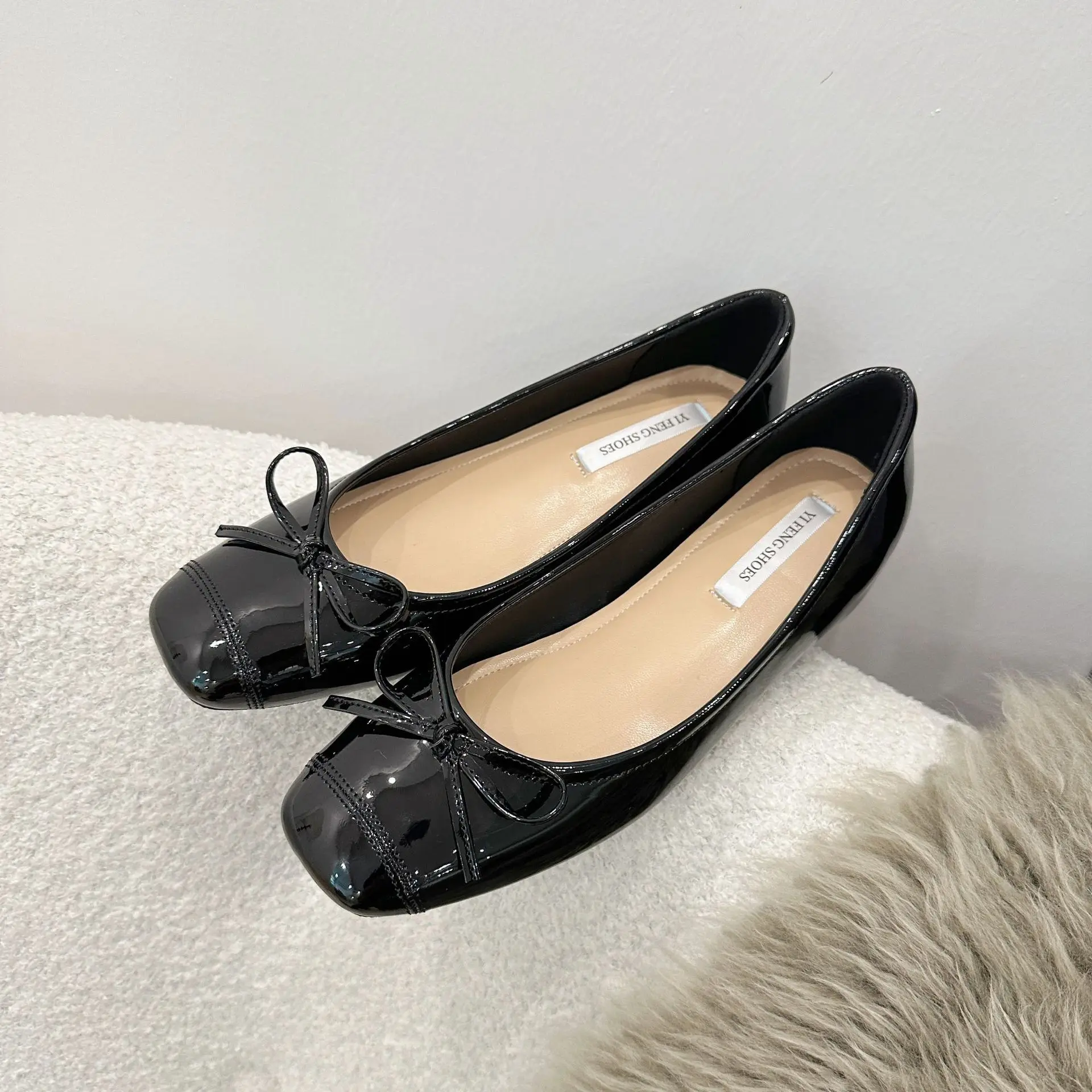 Ondiepe vrouwelijke zachte ronde neus dames flats met schoenen dia's schoenen mode vlinderknoop dames ballet flats dansschoenen