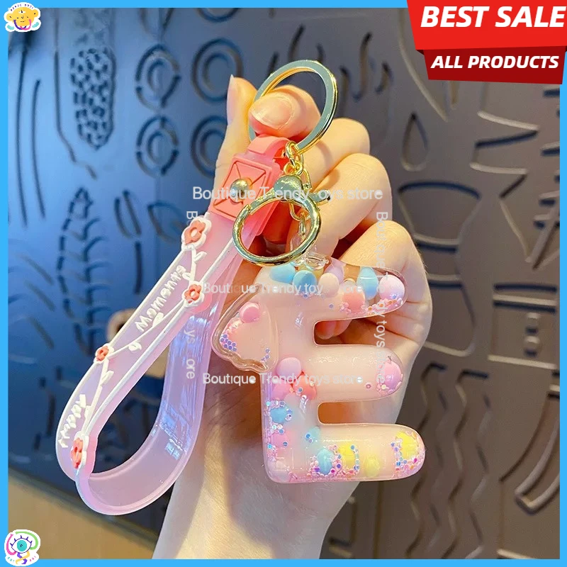 

Мультяшный акриловый брелок-подвеска с жидким песком, алфавитом и цветными шариками, для пар, девочек, рюкзаков и автомобилей