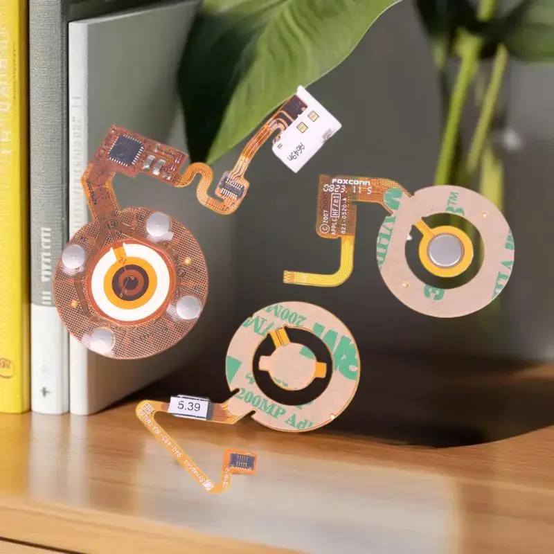 Akcesoria do iPod Nano 2, 3, 5: Wytrzymałe kółko nawijania i taśma flex.