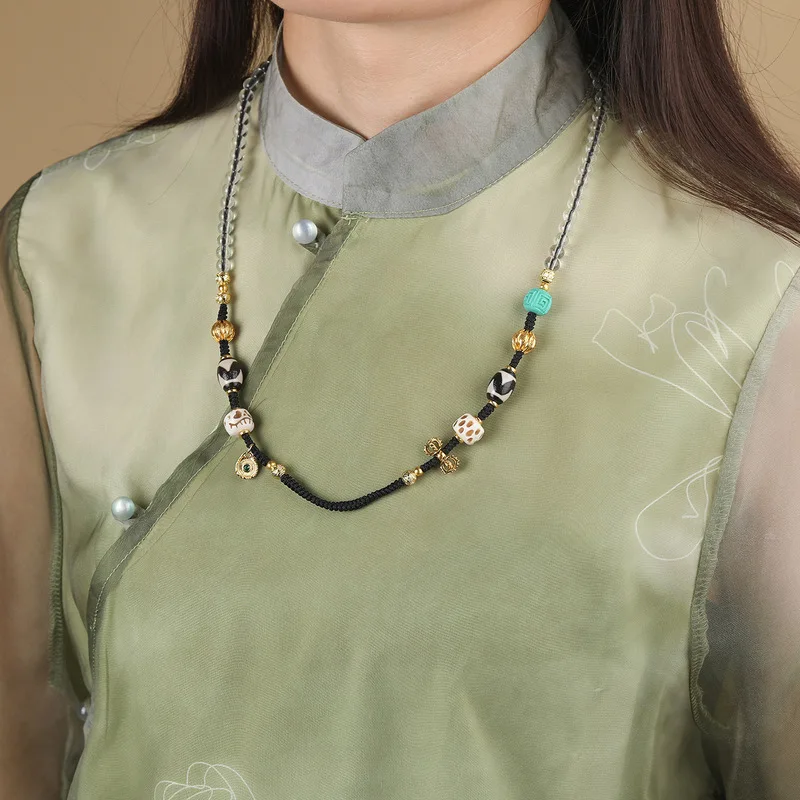Tibetan-Style Hand-Knotted Cotton Rope Necklace With A Wealth God Pendant, Featuring A Dharma Bead, A Thangka Carving, And A Han