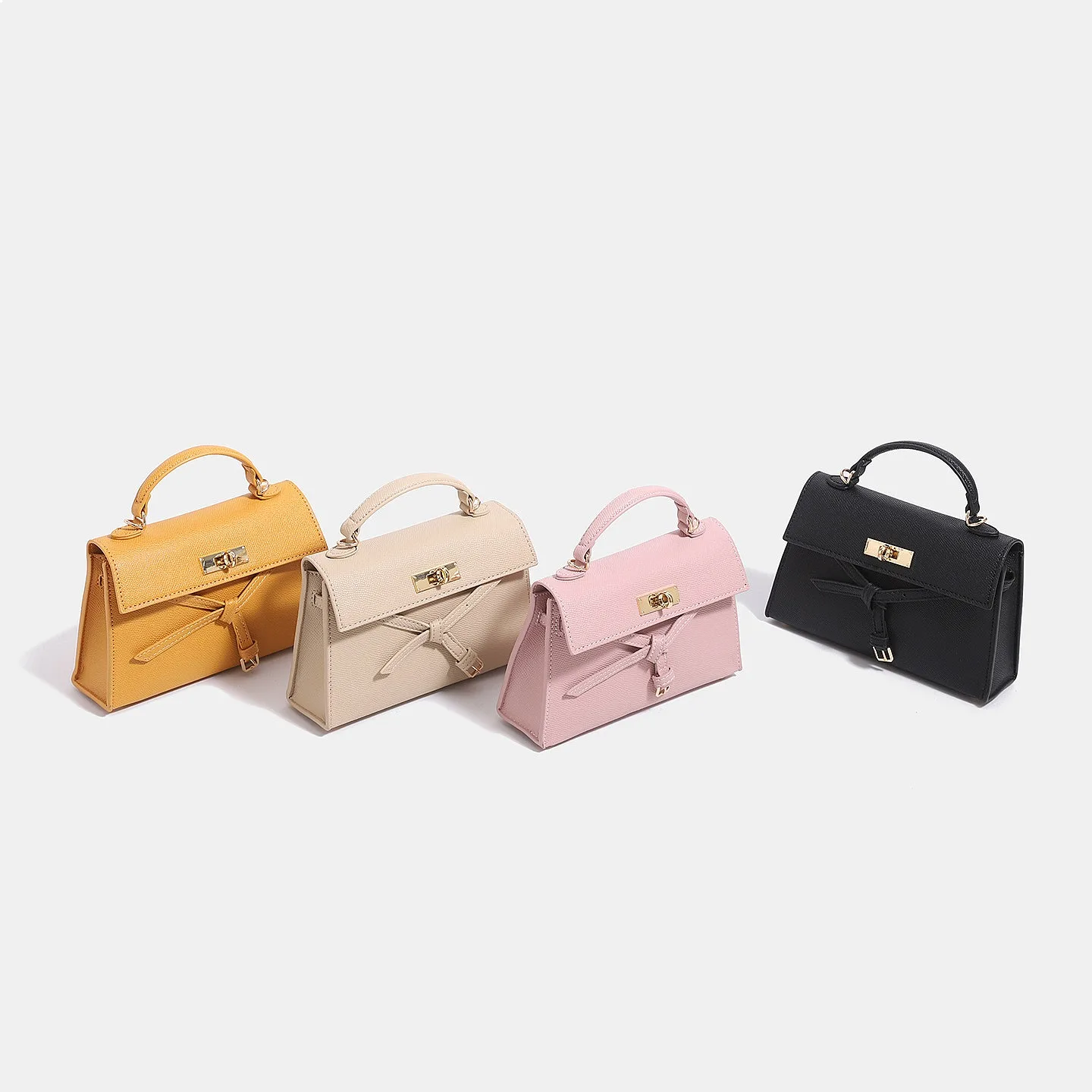2026 Autumn New Premium Grained Leather Handheld Kelly Bag Elegant Commute Shoulder Crossbody Bow Knot Bag for Women