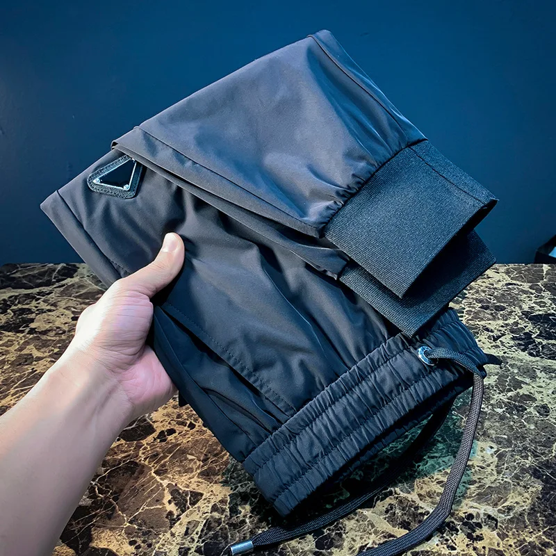 Pantalones deportivos informales ultrafinos de verano para hombre, pantalones ajustados de secado rápido, elásticos, ligeros y a la moda