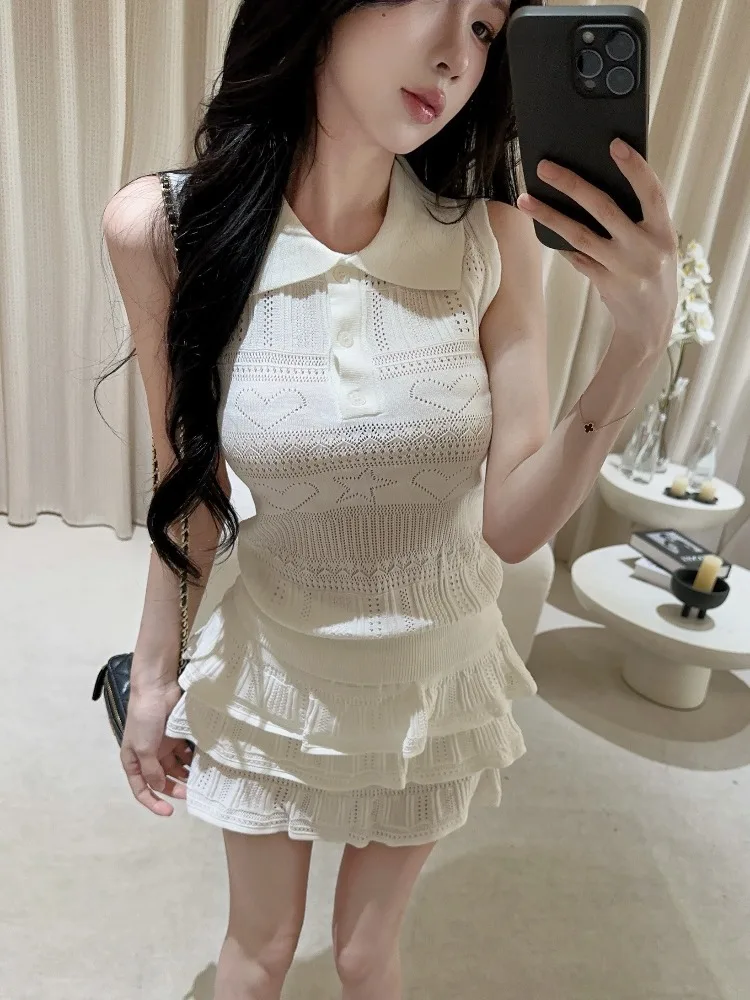 

Casual Knitted Hollow out Sleeveless Vest And Skirt Two Piece Set for Women Spring Design Sensation Soft And Elegant