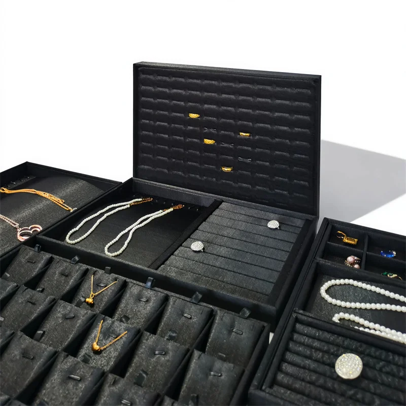 

Высококачественный лоток для хранения ювелирных изделий из черной матовой ткани для хранения колец, подвесок, ожерелий и браслетов