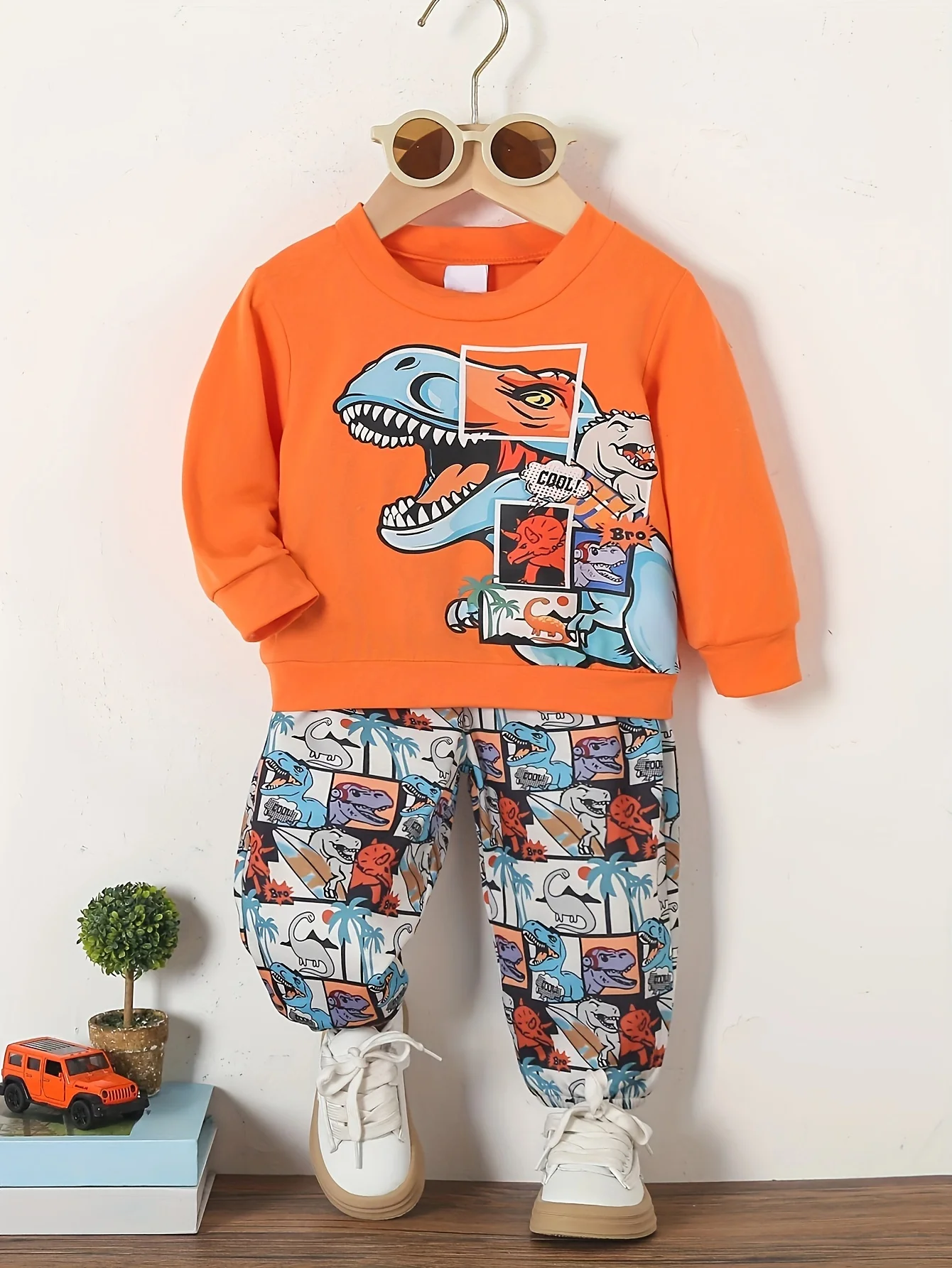 Spring And Autumn Cartoon Dinosaur Print Orange Long Sleeve Full Print Pants Fabric Soft Suitable For Outdoor And Base Wear Suit