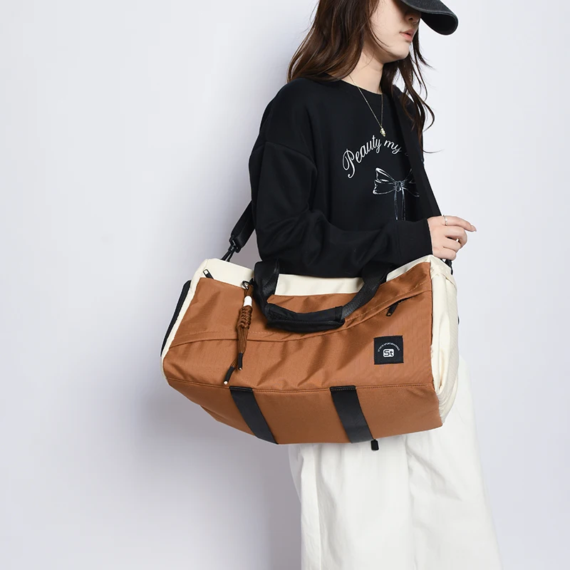 

Multi-functional waterproof travel bag with large capacity compartmental storage, single-shoulder cross-body bag