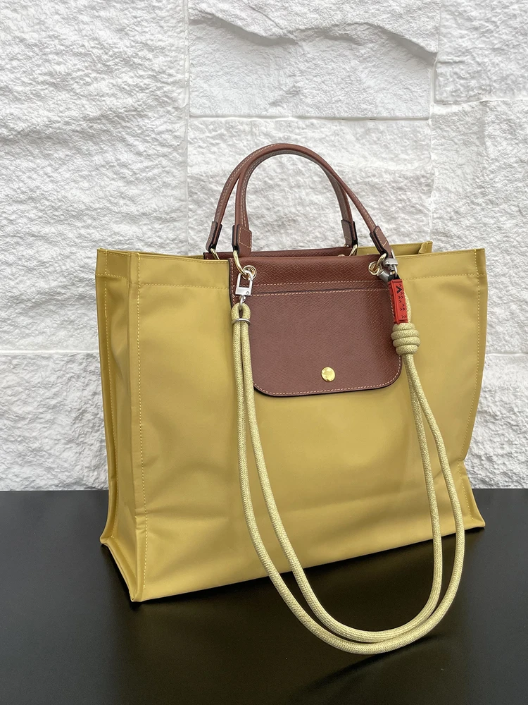 

Top Layer Cowhide Leather Nylon Waterproof Handbag Large Capaci Commuter Briease Single oulder Slant Cross Big Bag