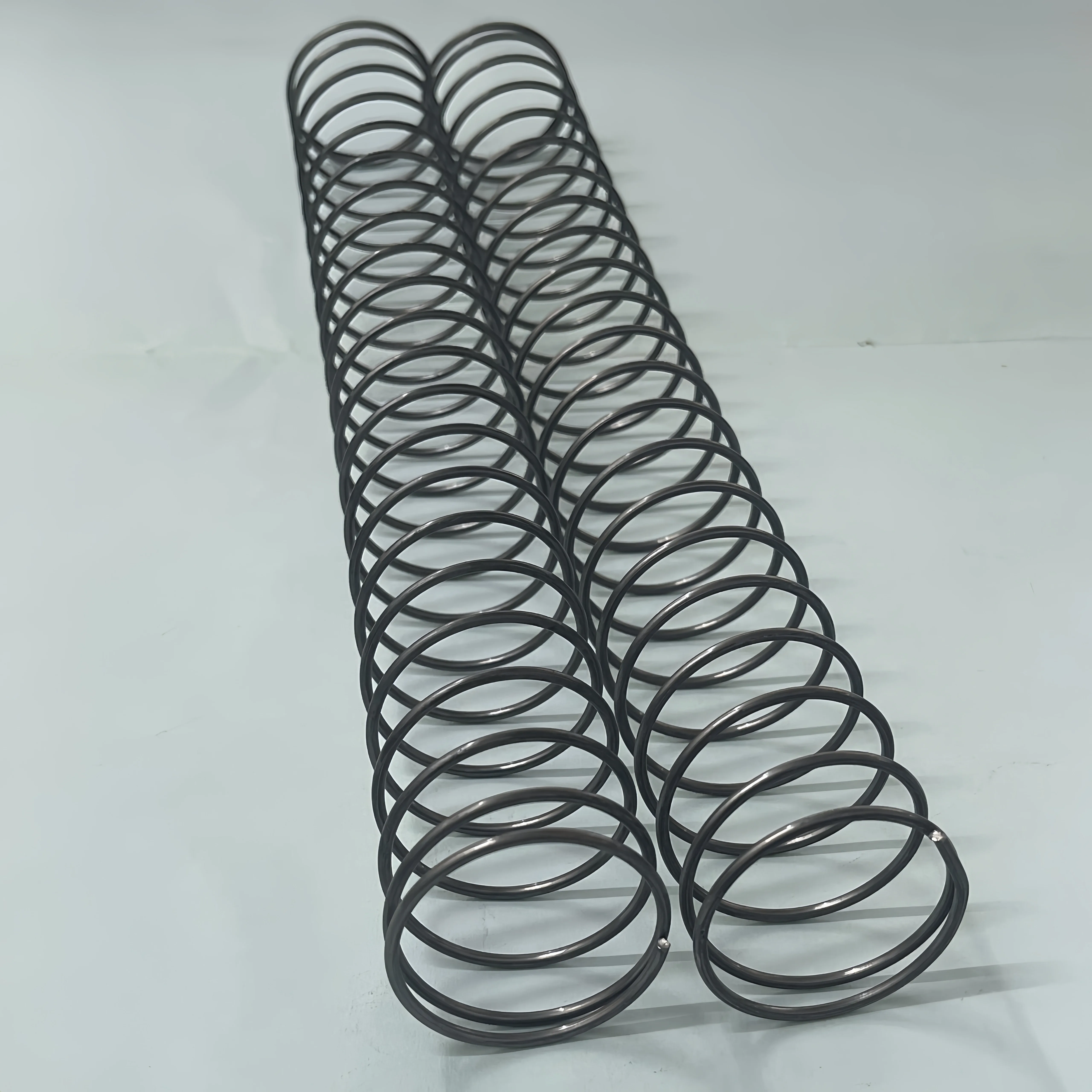 

2pcs 305mm Compression Springs, 2.0mm Dia×40mm OD, Cuttable, High-strength Carbon Steel, Corrosion-resistant, Accurate Rebound,