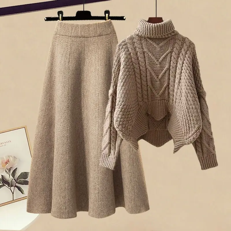 

Комплект больших размеров для осени и зимы: женский винтажный вязаный свитер свободного кроя в стиле «ленивый шик» и облегающая юбка-миди — модный комплект из двух предметов.
