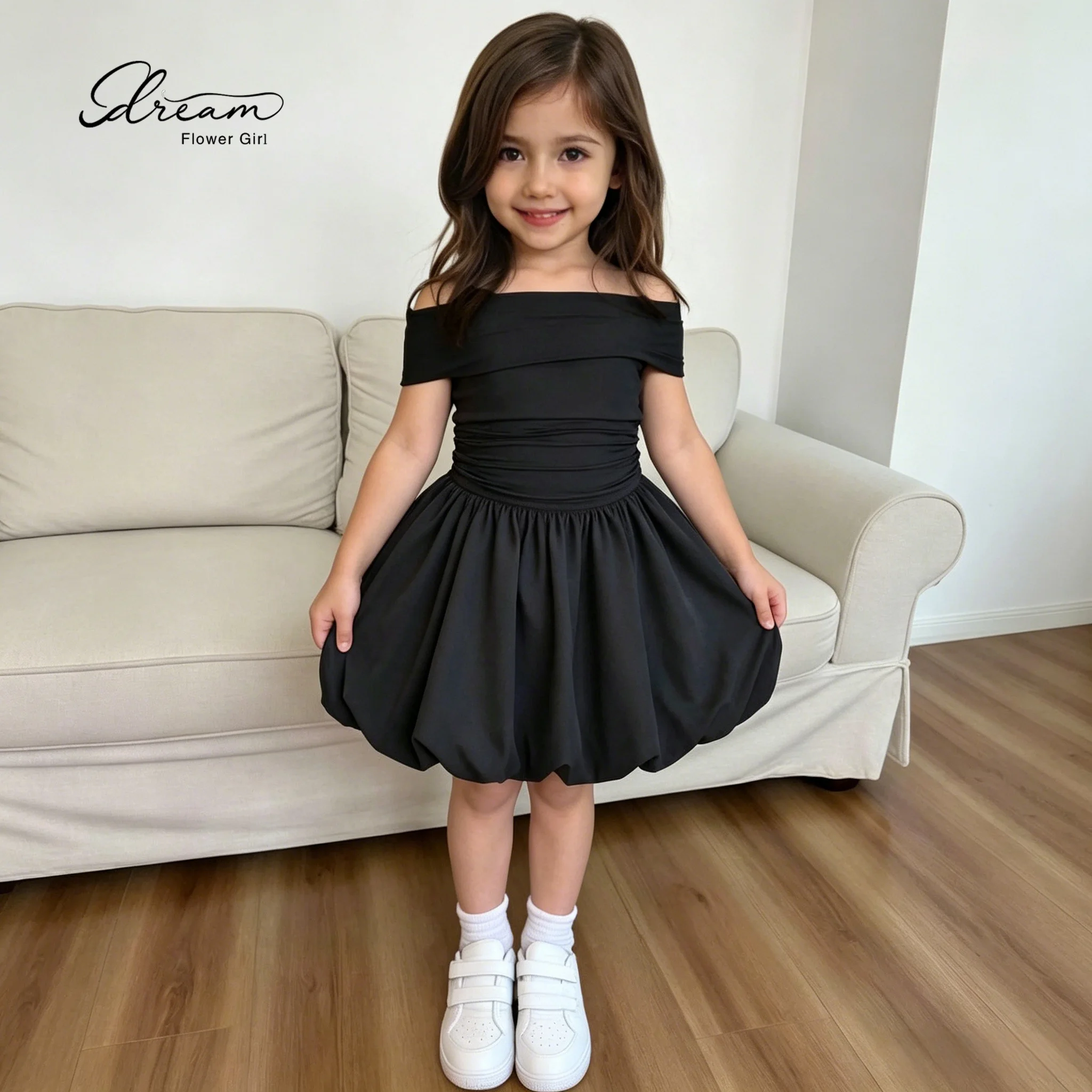 Black off-the-shoulder strapless knee-length formal party dress for girls featuring a draped voluminous skirt