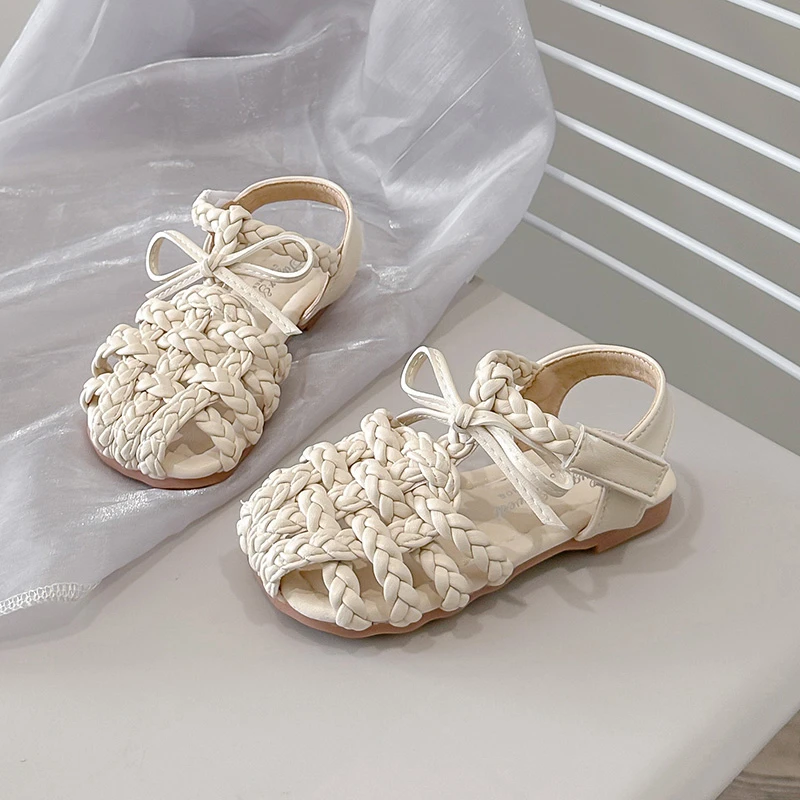 JGSHOWKITO Girls Princess Shoes Non-slip Soft Sole Color Kids Sandals Weave Solid 2026 New Kids Beach Shoes Vintage Simple Bows