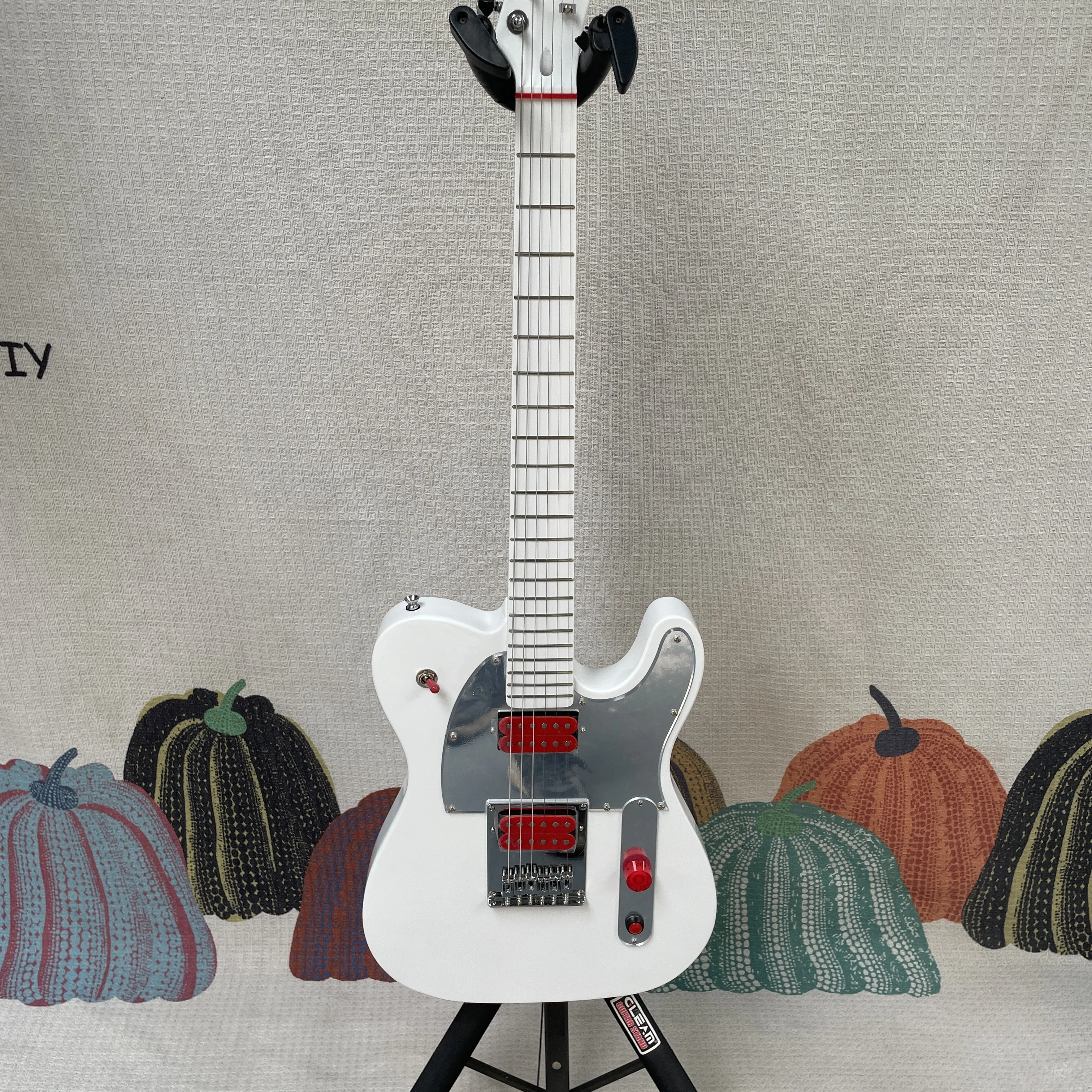 Gloss White Electric Guitar, Dual Red Closed Humbuckers, Mirror Metal Pickguard, Chrome Fixed Bridge, Red Knobs, 22 Frets