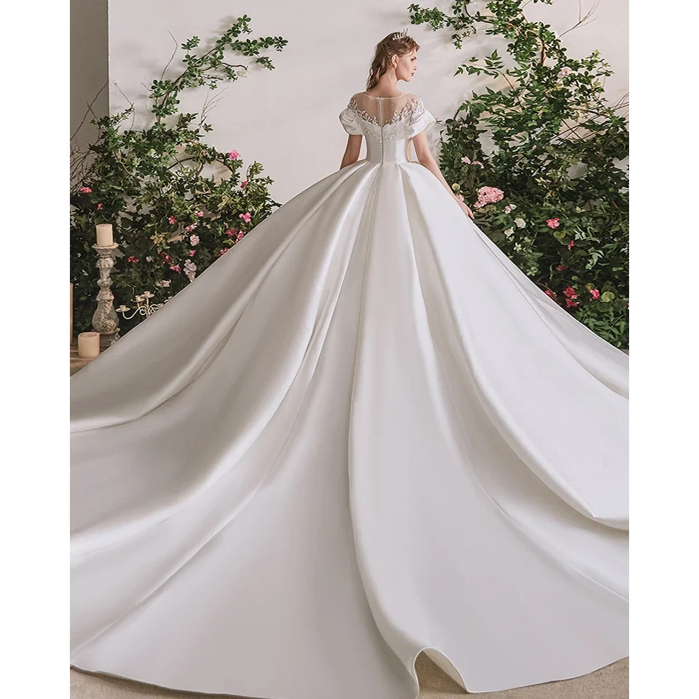 Vestidos de novia blancos para mujer, elegantes vestidos de baile con perlas y cuentas, exquisitos vestidos de novia drapeados de manga corta con cola de corte